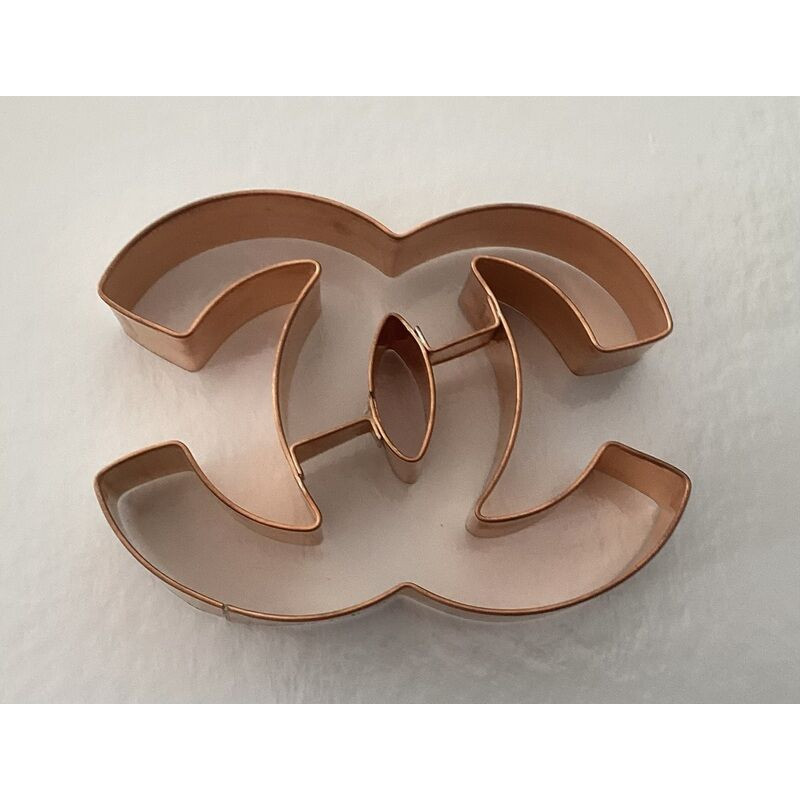 Cortador Cobre Logo Chanel