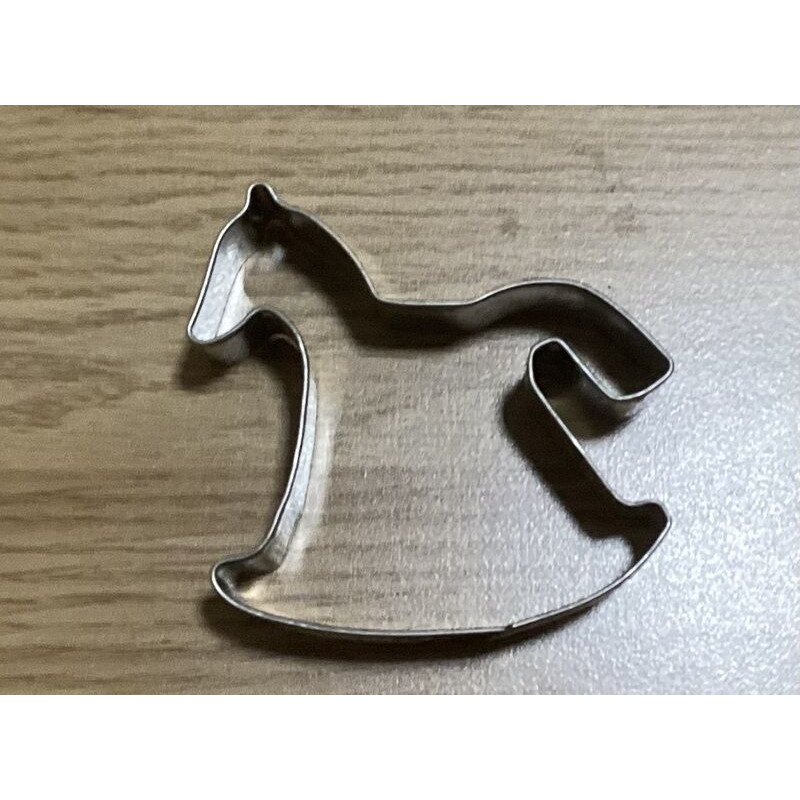 Cortador cavalinho de baloiço